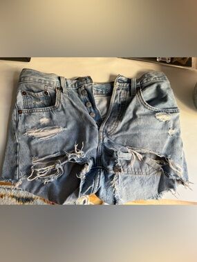 Levi's Distressed Light Blue Denim Shorts with Contrast Stitching - vintage